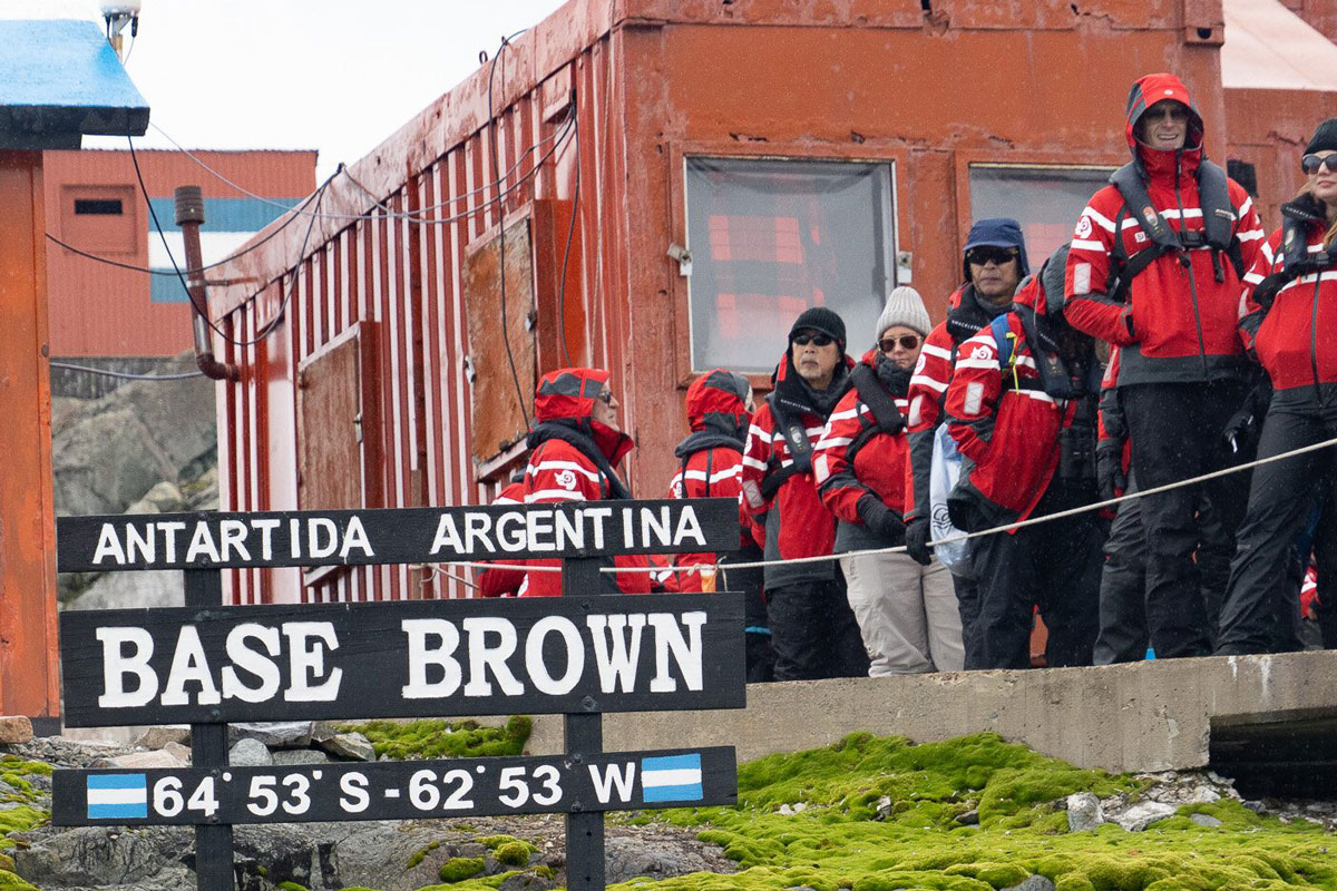 Passengers visiting Brown Station in Paradise Bay, Antarctica