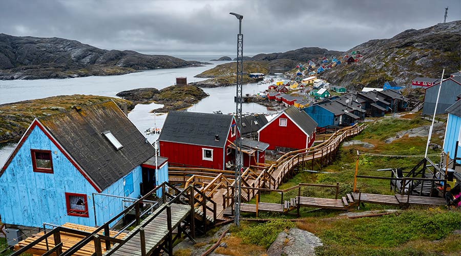 long-wooden-path-through-settlement-short